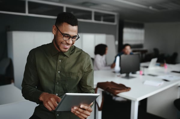 marketer using a messaging app to communicate with customers and offer support
